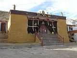 Tibet Kailash 06 Tirthapuri 16 Gompa Outside The most sacred relics in the Guru Rinpoche (Tirthapuri) Gompa are two stone footprints of Guru Rinpoche and his consort Yeshe Tsogyel to the right of the altar. Yeshe Tsogyel is a 'sky dancer' and reincarnation of Vajrayogini, the fierce protecteress of Tibet  There is also an image of Sakyamuni flanked by Padmasambhava (Guru Rinpoche) and his two consorts. No photography was allowed.